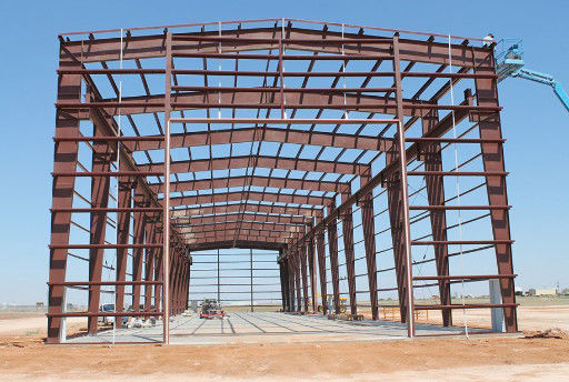 Armazém de estruturas pré-fabricadas de aço com painel de sanduíche, revestimento de telhado de vidro de lã e kits de construção de aço Q235/Q345